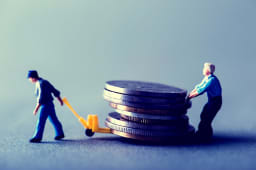 Figurine tirant de l'argent