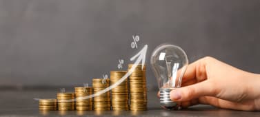 une ampoule et des pices de monnaie.