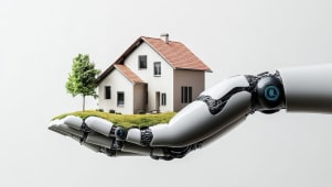 Bras robotique tenant une maison et un arbre sur fond blanc.