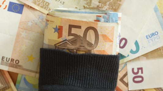 De l'argent dans un bonnet