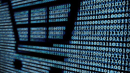 Un chariot et du code informatique