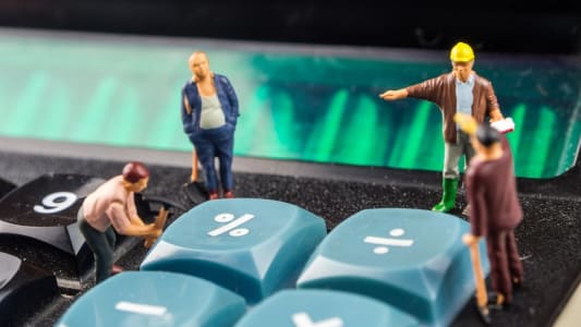 Un pourcentage et une calculatrice