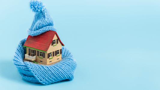 Une maison dans une charpe.