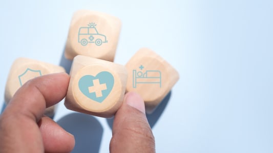 Une pice de bois avec un pictogramme reprsentant la sant.