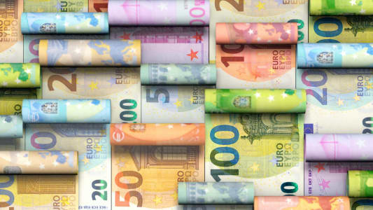 Des billets enrouls.
