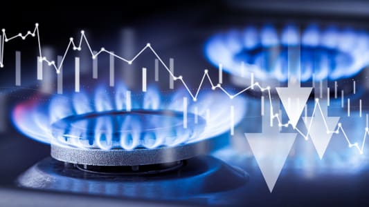Les symboles du gaz et d'une baisse des prix.