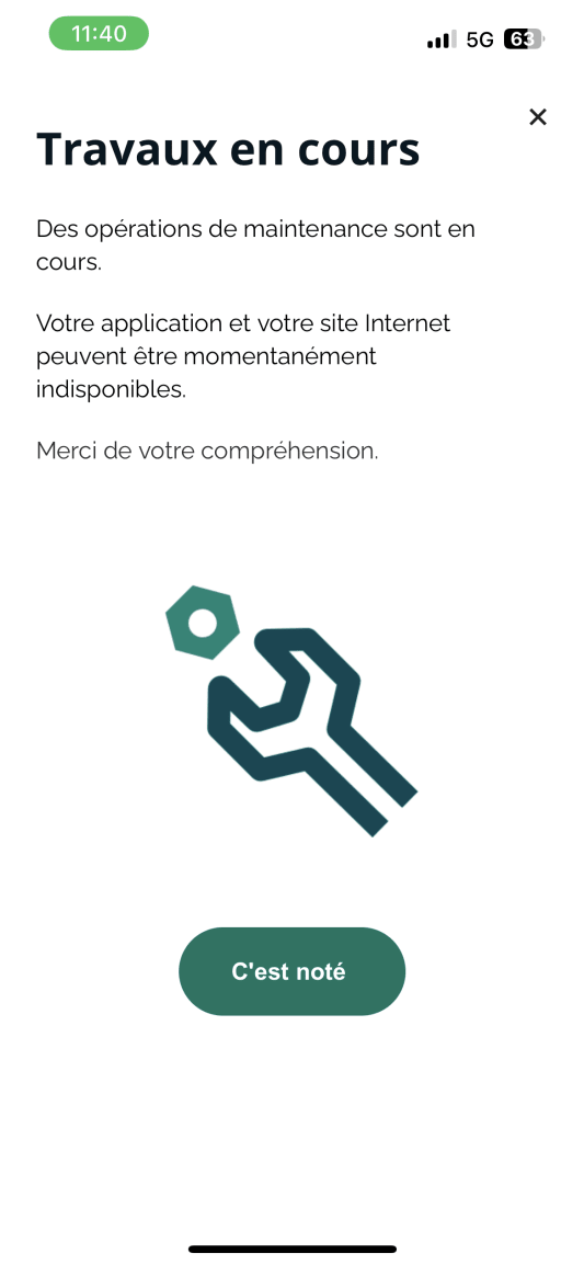 �cran de smartphone affichant un message de maintenance en cours.