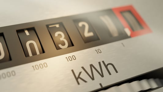 Gros plan d'un compteur lectrique analogique