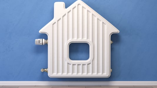 Un radiateur en forme de maison.